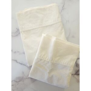 JcPenny home twin flat sheet cream and 1 swiss dot textured pillowcase sham